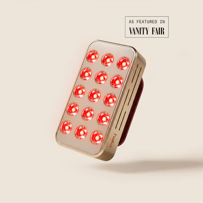 Halio RegenBoost handheld red light therapy panel with glowing LEDs; “AS FEATURED IN VANITY FAIR” text visible.