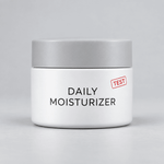 White jar of [TEST] Daily Moisturizer with a silver lid and red TEST stamp.