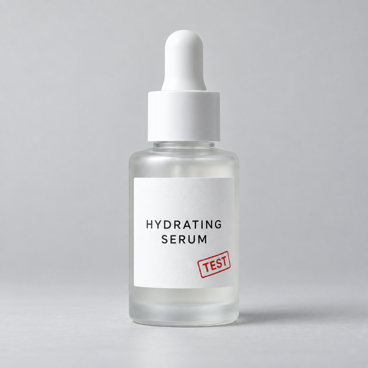 White dropper bottle labeled “HYDRATING SERUM” with a red “TEST” stamp.